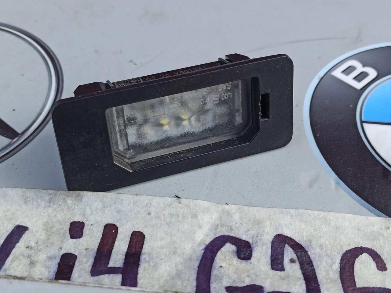 подсветка номера BMW i4 G26 2022, электро, АКПП, 9481841 - фото №1