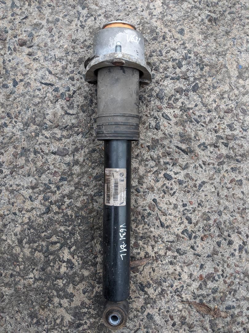 амортизатор задний левый BMW X5 E70 2009, 4.8 л., N62 B48 A, бензин, АКПП, внедорожник 5 дв. - фото №1