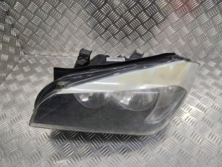 фара левая BMW X1 E84 2011, 89093492