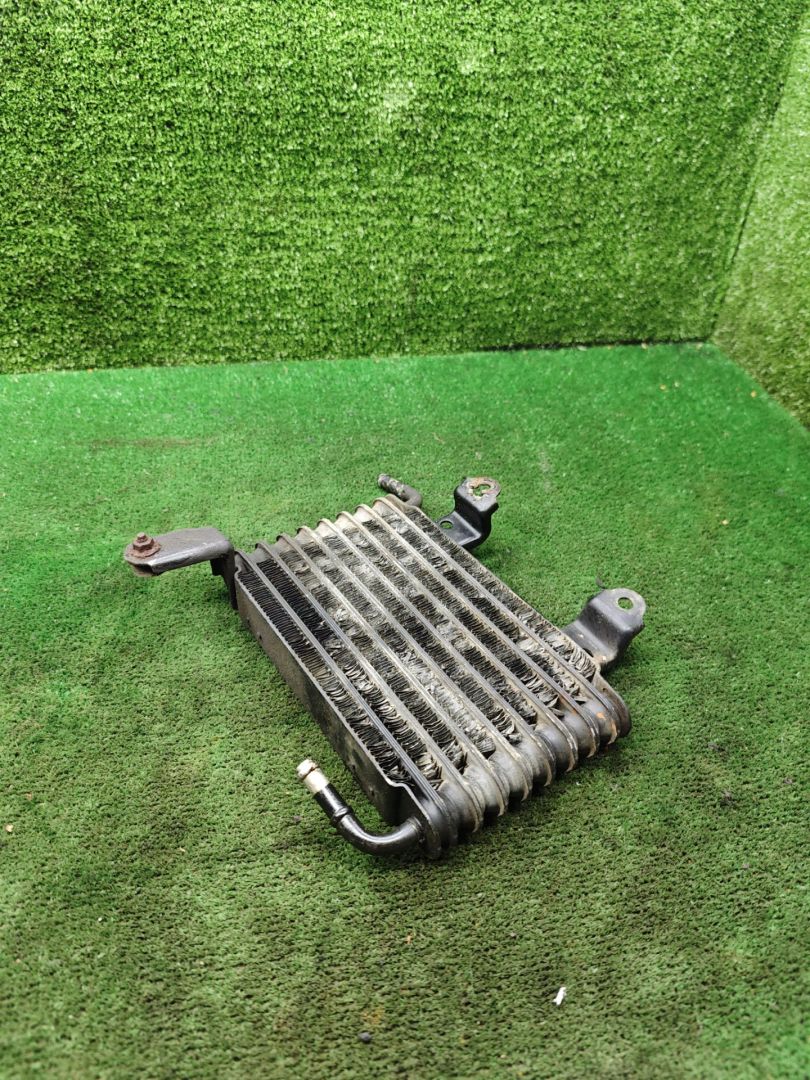 радиатор масляный Toyota Corolla 7 поколение (E100) 1995, 1.6 л., 4A-FE, бензин, МКПП, хетчбэк 3 дв. - фото №1