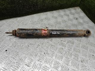 амортизатор задний левый Mitsubishi Pajero 2 поколение 1996, 3.0 л., 6G72 (SOHC 24V), бензин, АКПП, внедорожник 5 дв.