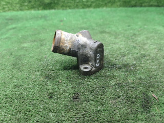 фланец (тройник) системы охлаждения Mazda 626 GE [рестайлинг] 1997, 1.8 л., бензин, МКПП, хетчбэк 5 дв.