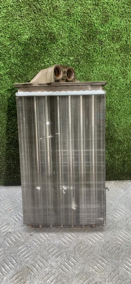 радиатор отопителя (печки) Chrysler Voyager 3 поколение 1997, 2.4 л., бензин, МКПП, минивэн - фото №1