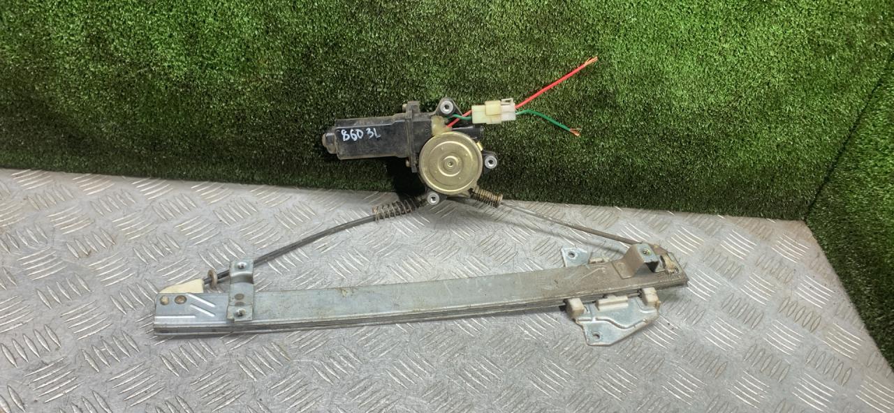 стеклоподъемник электрический задний левый Mitsubishi Pajero 2 поколение 1996, 3.0 л., бензин, АКПП, внедорожник 5 дв. - фото №1