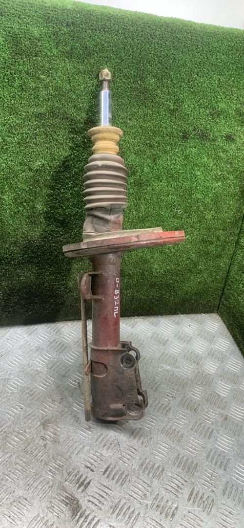 амортизатор передний левый Dodge Caravan 4 поколение 2002, 2.4 л., бензин, АКПП, минивэн - фото №1