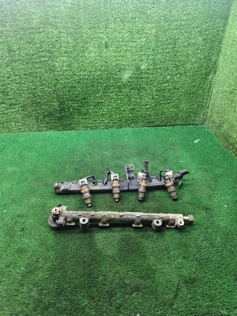 форсунка Toyota Corolla 7 поколение (E100) 1995, 1.3 л., 4E-FE, бензин, МКПП, хетчбэк 3 дв., 2325011100 - фото №1