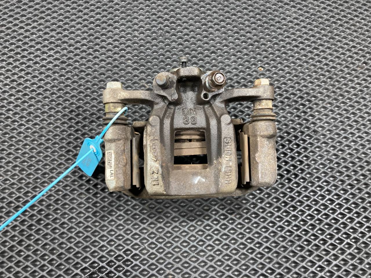 суппорт задний левый Kia K5 3 поколение 2020, 1.6 л., G4FP, бензин, АКПП, 58210L1050 - фото №1