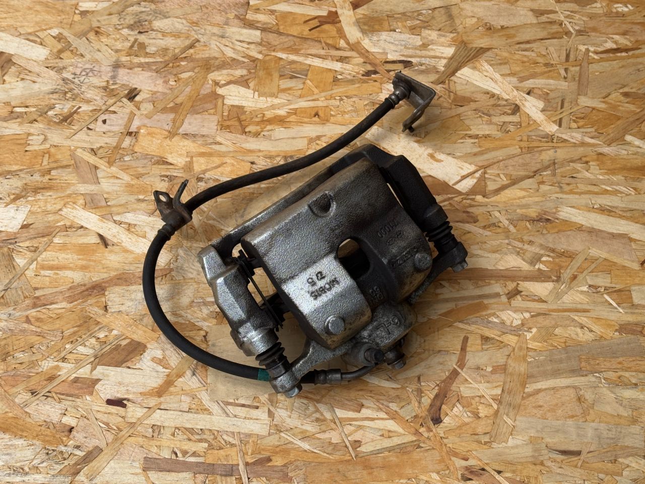 суппорт передний левый Kia K5 3 поколение 2022, 1.6 л., G4FP, бензин, АКПП, 58110L0000 - фото №1