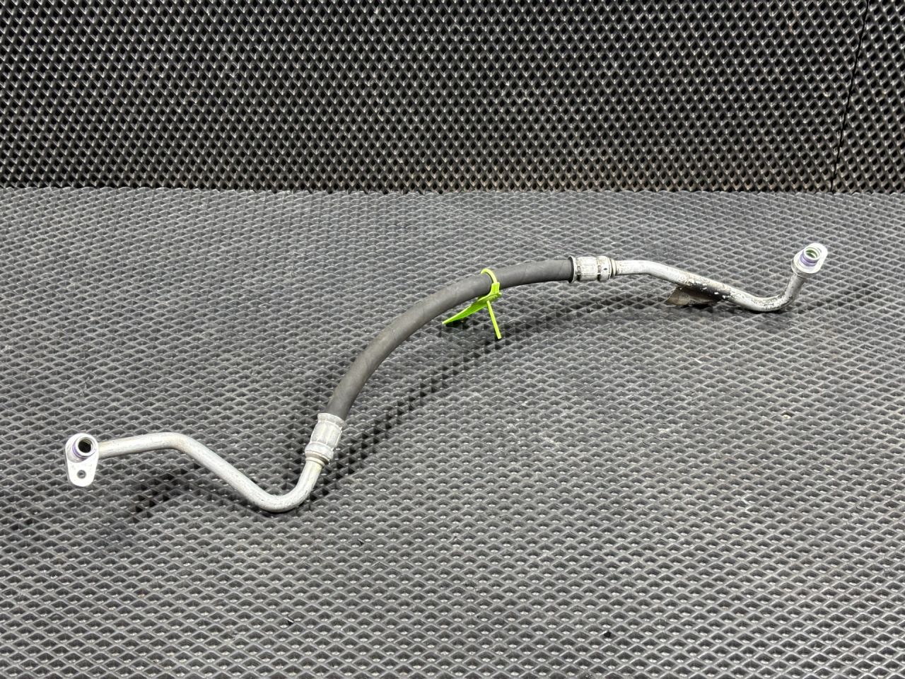 трубка кондиционера Jaguar F-Pace 1 поколение 2016, 3.0 л., 306PS, бензин, АКПП, внедорожник 5 дв., GX7319N601CB, T2H6662 - фото №1