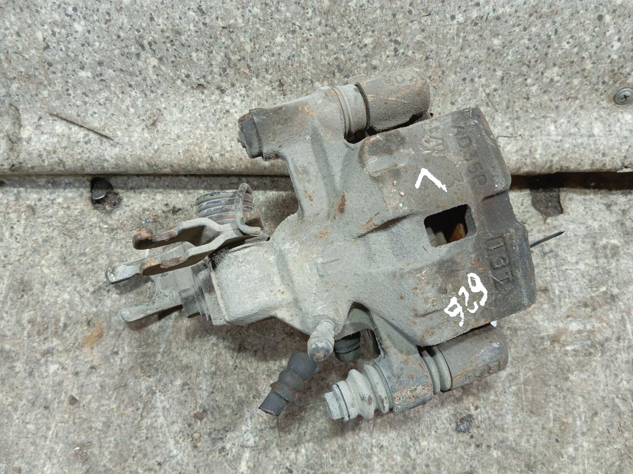 суппорт задний левый Mazda 626 GF (1997 - 1999) - фото №1