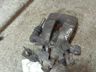 суппорт задний левый Opel Astra H (2004 - 2007)