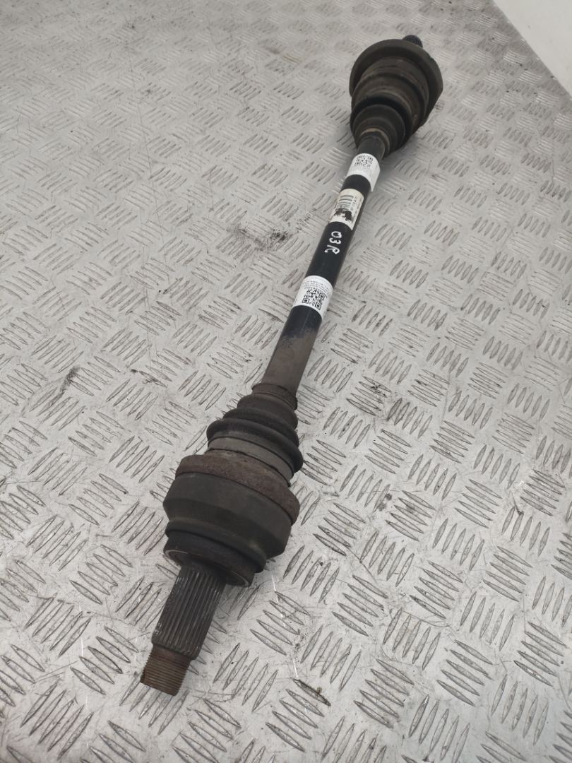 полуось задняя (приводной вал, ШРУС) BMW 5 серия F07/F10/F11 F10 2011, 3.0 л., N57 D30 A, дизель, АКПП, carbonschwarz metallic (416), седан, задний привод, правый руль, 33207581018, 7581018 - фото №1