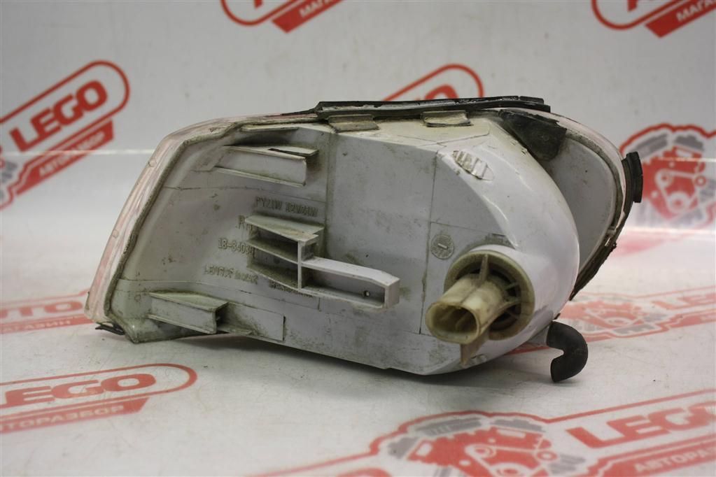поворотник правый Opel Vectra B 31 1999, 1.8 л., Z 18 XE, бензин, МКПП, синий, седан, передний привод - фото №1