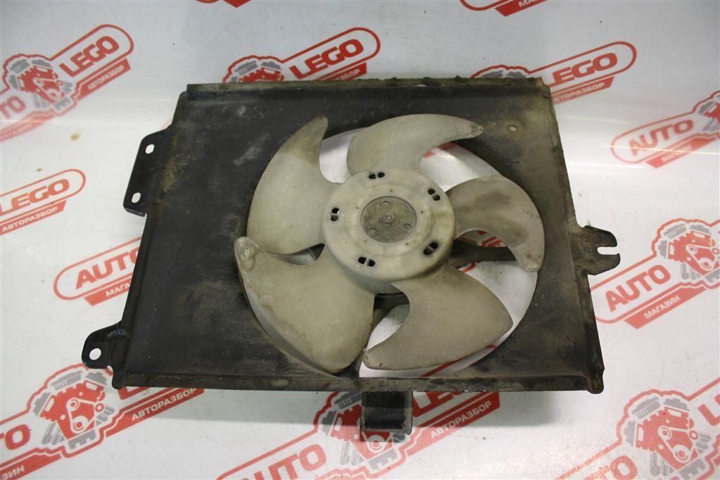 вентилятор радиатора Mitsubishi Mirage 5 поколение C12A 1995, 1.3 л., 4G13 (12V), бензин, АКПП, серый, купе, передний привод, правый руль - фото №1