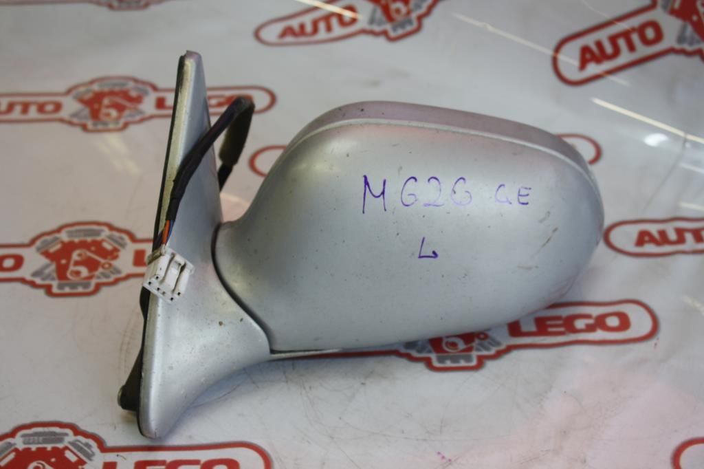 зеркало наружное левое Mazda 626 GE (1991 - 1997), 1.6 л., FS, бензин, МКПП, серый, седан, передний привод - фото №1