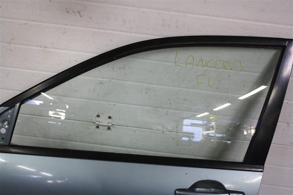 стекло двери передней левой Mitsubishi Lancer 9 поколение C12W 2006, 1.6 л., 4G18, бензин, МКПП, зеленый, седан, передний привод, MR525731 - фото №1