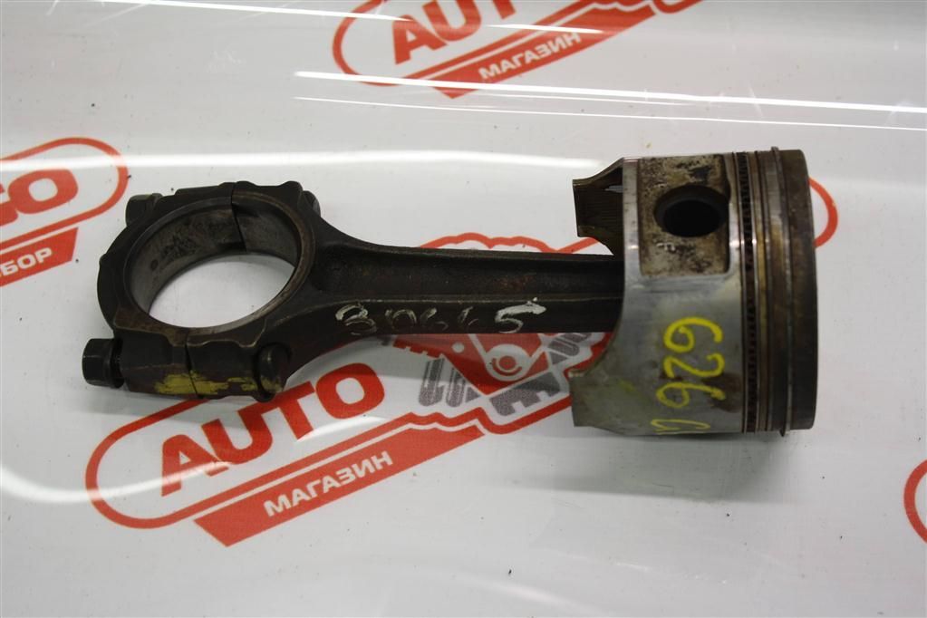 поршень Mazda 626 GE (1991 - 1997), 1.6 л., FS, бензин, МКПП, серый, седан, передний привод - фото №1