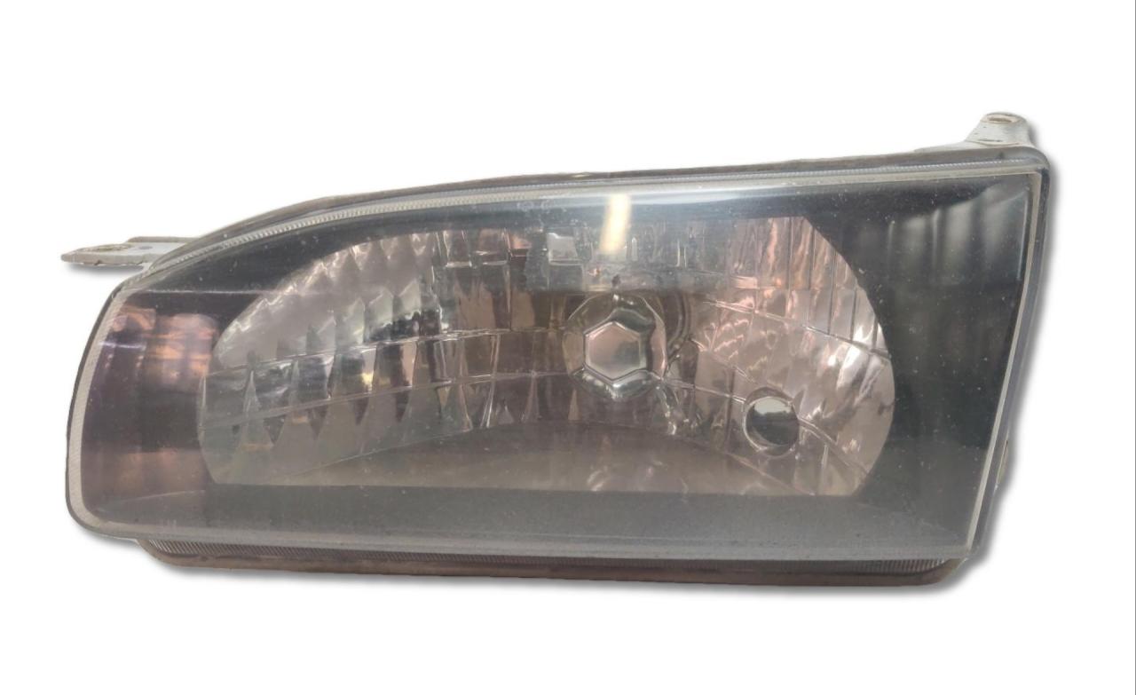 фара левая Toyota Corolla 8 поколение (E110) AE114 1997, 1.6 л., 4A-FE, бензин, МКПП, седан, полный привод, 811501A520 - фото №1