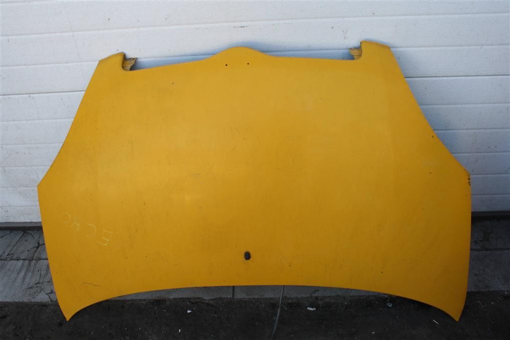 капот Toyota Echo 1 поколение NCP10 2001, 1.5 л., 1NZ-FE, бензин, АКПП, желтый, седан, передний привод, 5330152060 - фото №1
