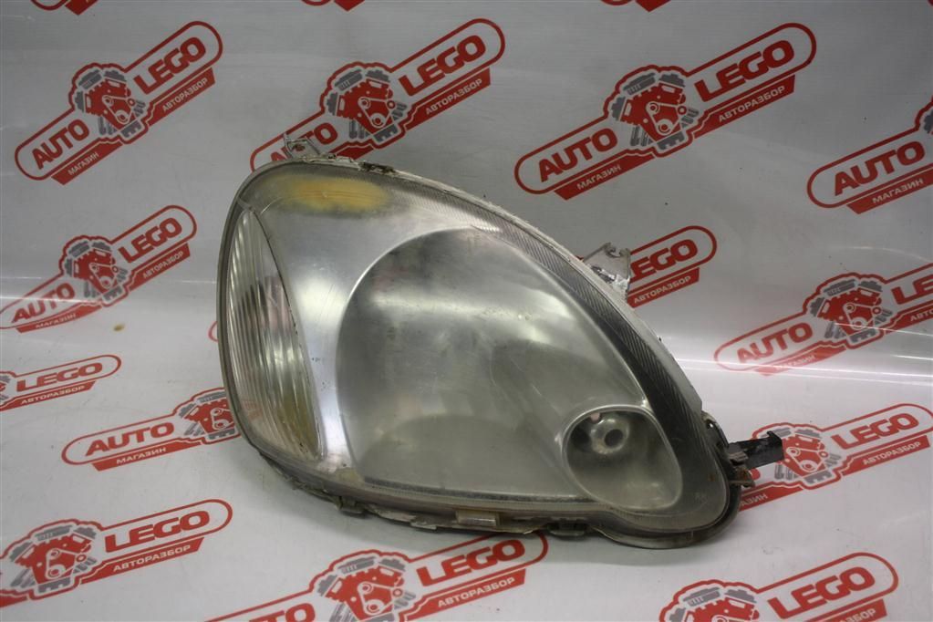 фара правая Toyota Echo 1 поколение NCP10 2001, 1.5 л., 1NZ-FE, бензин, АКПП, желтый, седан, передний привод, 8111052190 - фото №1
