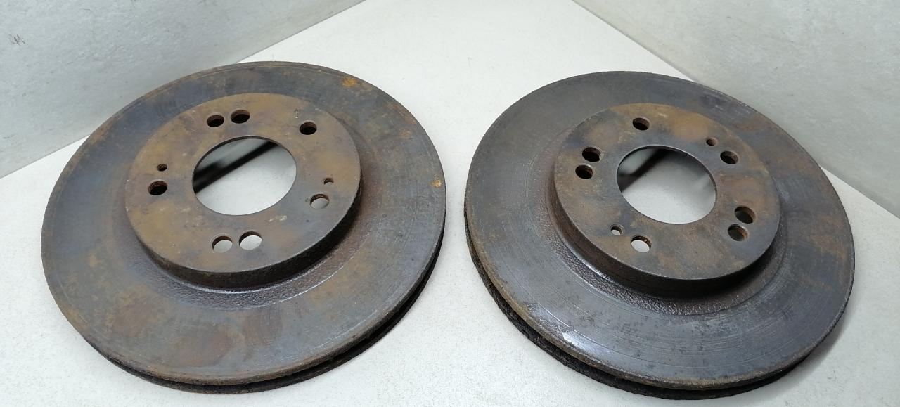 диски тормозные (комплект) Mitsubishi Sigma 1 поколение 1994, 3.0 л., i, 6G72 (DOHC 24V), бензин, 5МКПП, серый металлик, седан, передний привод - фото №1