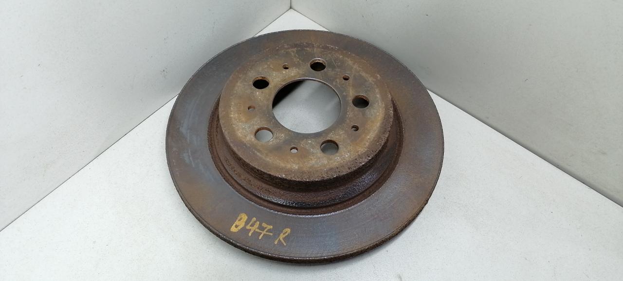 диск тормозной задний Volvo S60 1 поколение 2001, 2.4 л., B 5244 T3, бензин, АКПП, черный, седан - фото №1