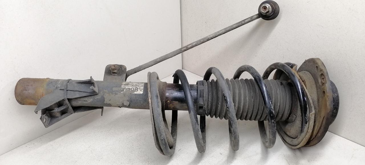 амортизатор передний левый Peugeot 206 1 поколение 2002, 1.4 л., i, бензин, 5МКПП, зелёный - фото №1