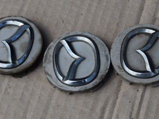 колпачок литого диска Mazda CX-7 1 поколение 2007, 2.3 л., Ti, бензин, АКПП, передний привод