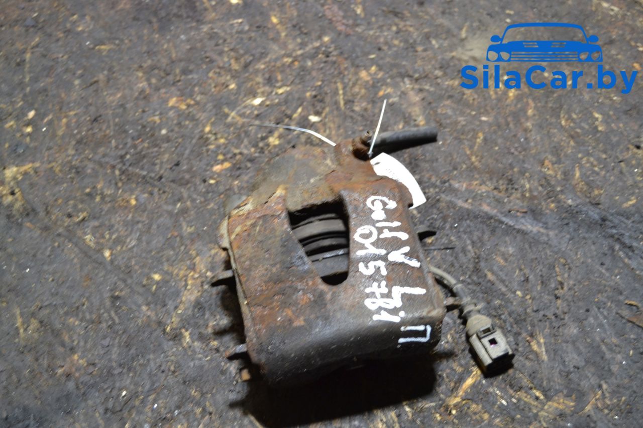 суппорт передний левый Volkswagen Golf 5 поколение (2003 - 2009) - фото №1