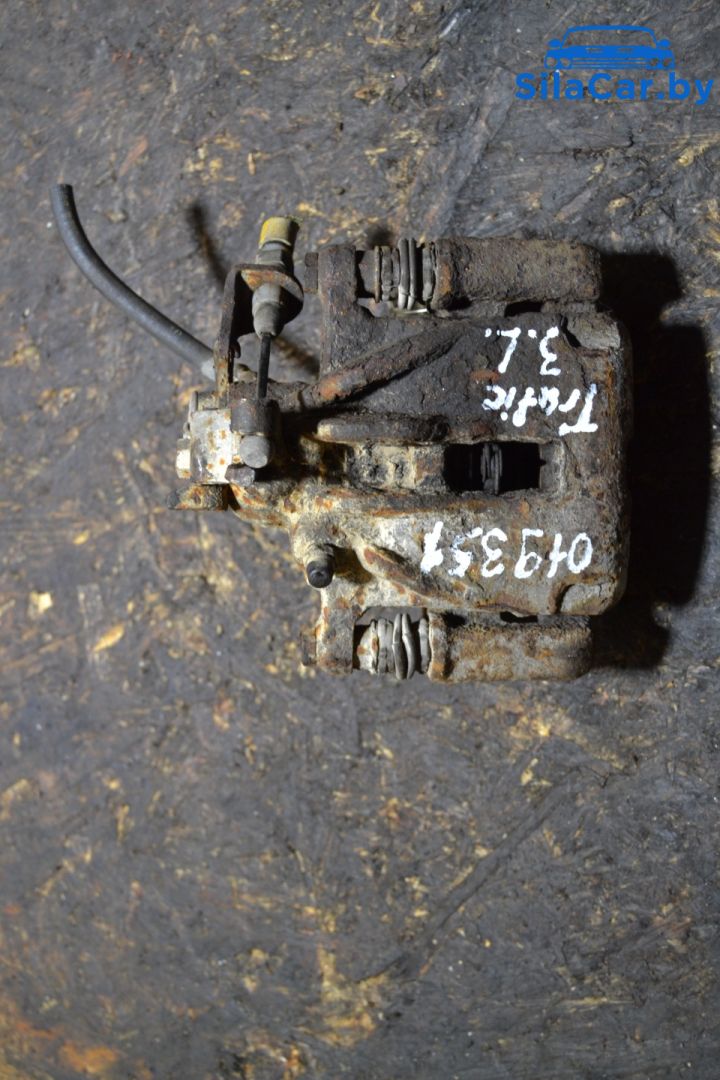 суппорт задний левый Renault Trafic 2 поколение 2003 - фото №1