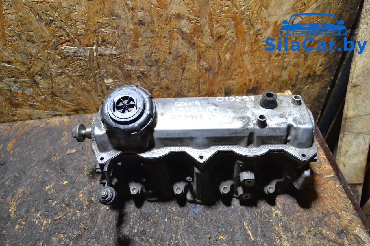 головка блока цилиндров Volkswagen Golf 4 поколение 1999, 1.9 л., дизель, 038103373E - фото №1