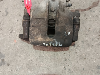 суппорт передний левый Renault Scenic 1 поколение (1996 - 1999), 1.9 л., дизель