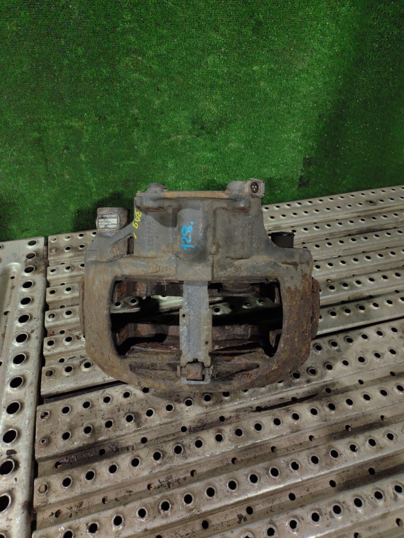 суппорт задний левый DAF XF 105 1 поколение 2006, АКПП, 1658010 - фото №1