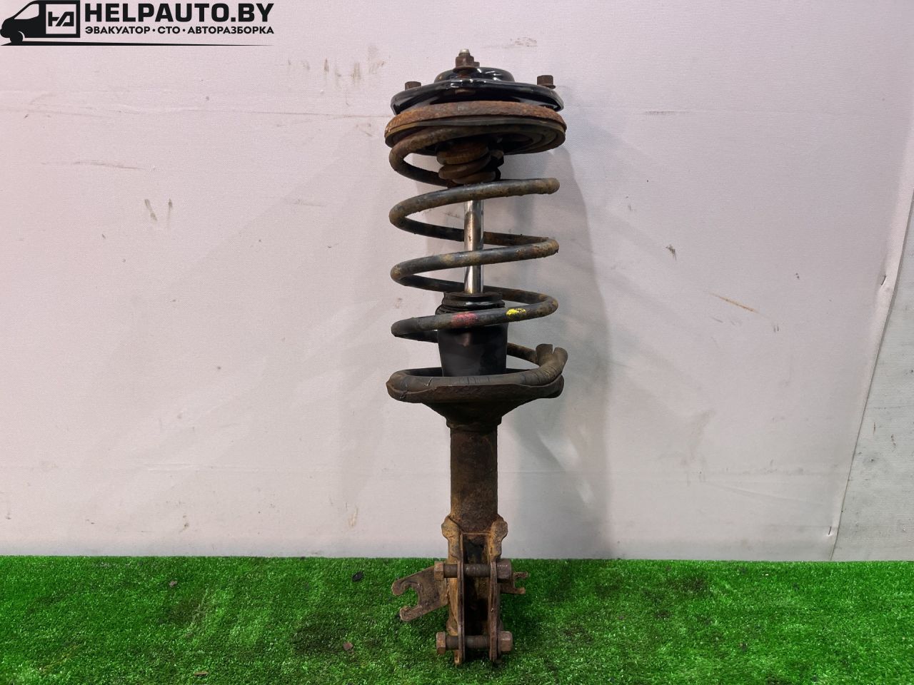 стойка передняя левая Mitsubishi Mirage 5 поколение 2002, 1.5 л., бензин, АКПП, чёрный, купе, передний привод - фото №1