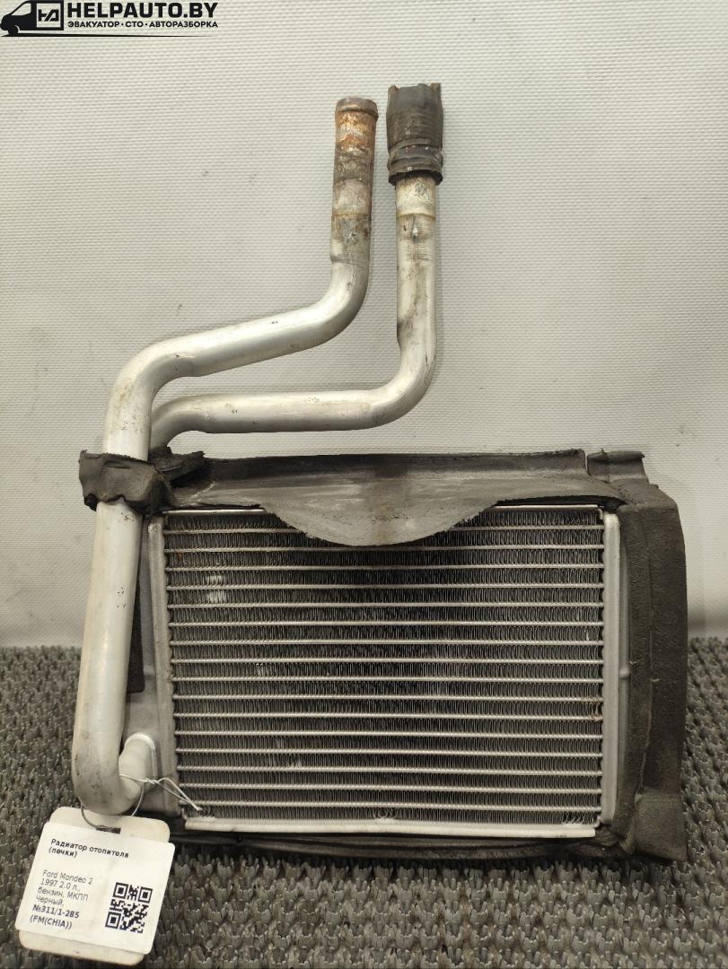 радиатор отопителя (печки) Ford Mondeo 2 поколение 1997, 2.0 л., бензин, МКПП, черный, универсал, передний привод - фото №1