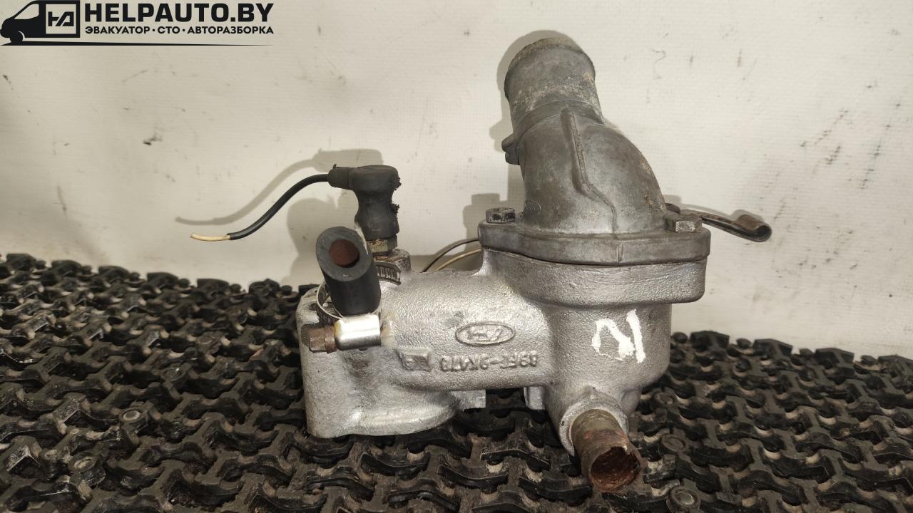 корпус термостата Ford Focus 1 поколение (1998 - 2001), дизель, МКПП, белый, универсал, передний привод - фото №1