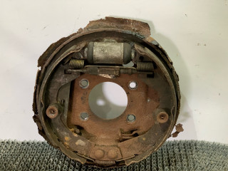 механизм развода задних тормозных колодок Nissan Bluebird T12/T72 1987, 2.0 л., бензин, МКПП, бордовый, хетчбэк 5 дв., передний привод
