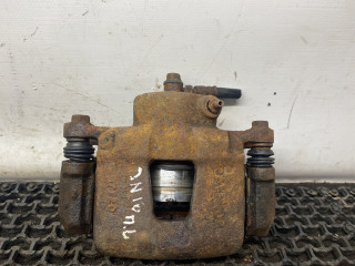 суппорт передний левый Daewoo Nubira J100 1998, 1.6 л., бензин, МКПП, зелёный металлик, хетчбэк 5 дв.