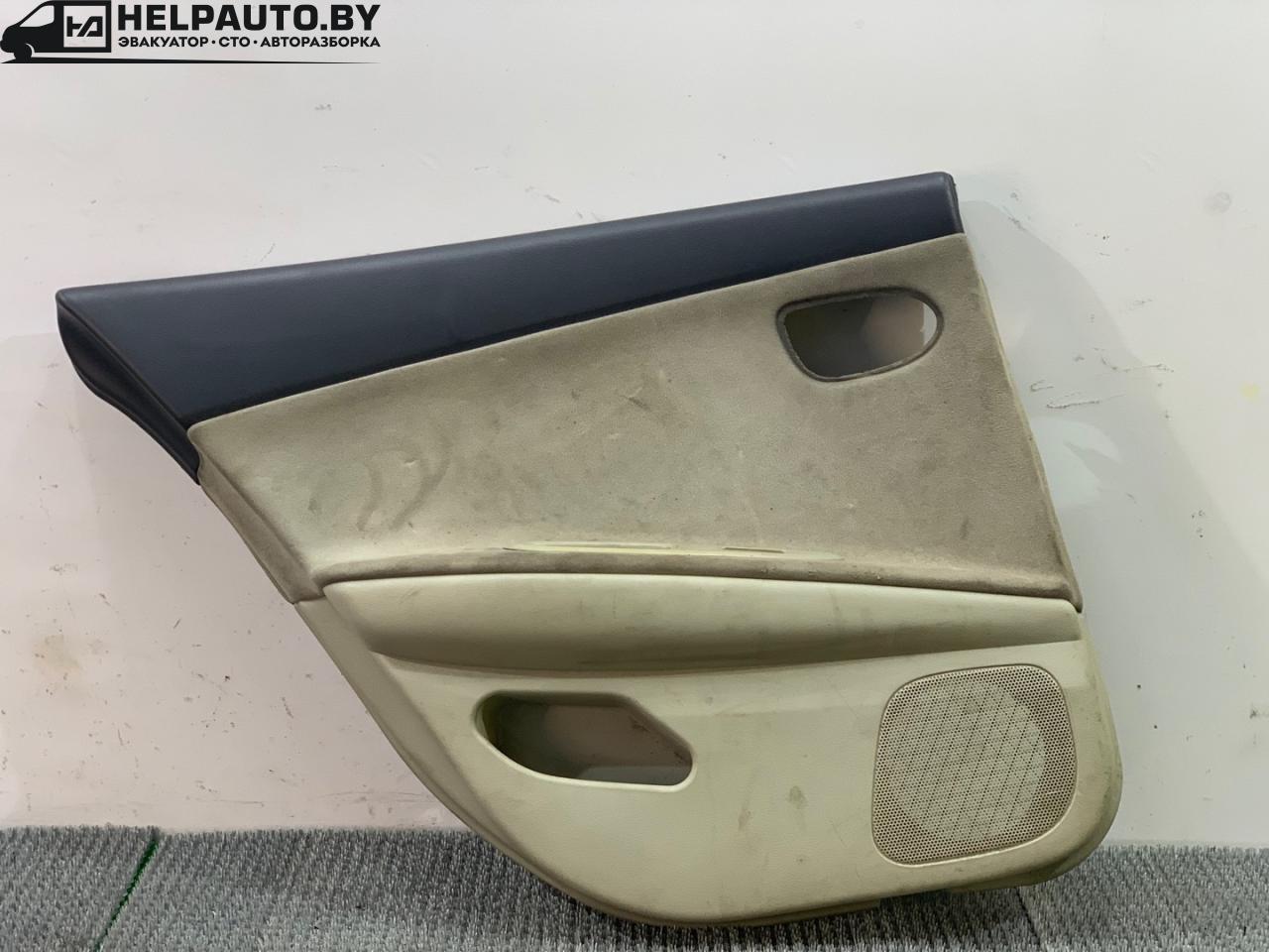 обшивка двери задняя левая Nissan Primera P12 2002, 2.2 л., дизель, универсал, передний привод - фото №1
