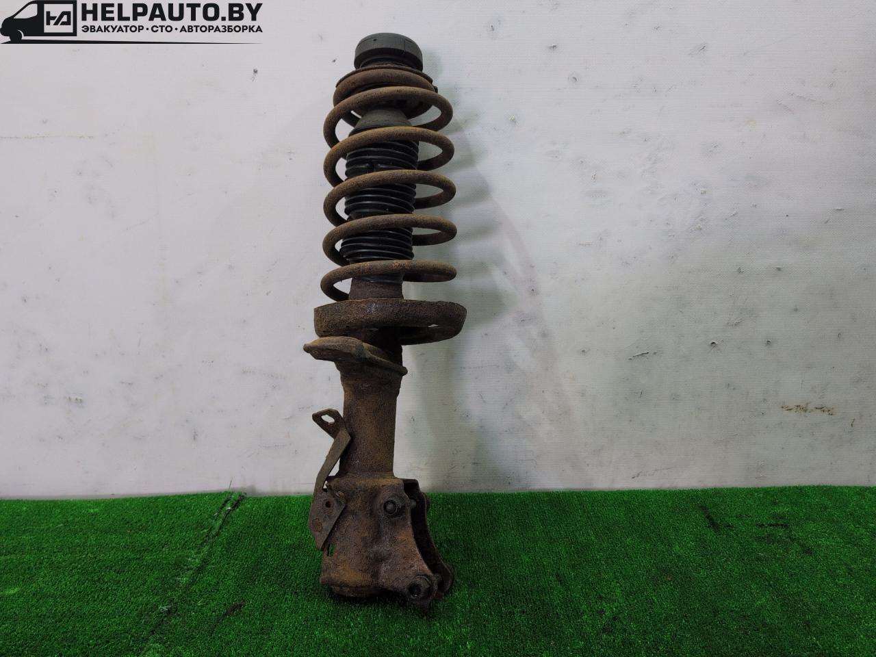 стойка передняя левая Audi 80 B3 1990, 1.6 л., PP, бензин, МКПП, оранжевый, седан, передний привод - фото №1