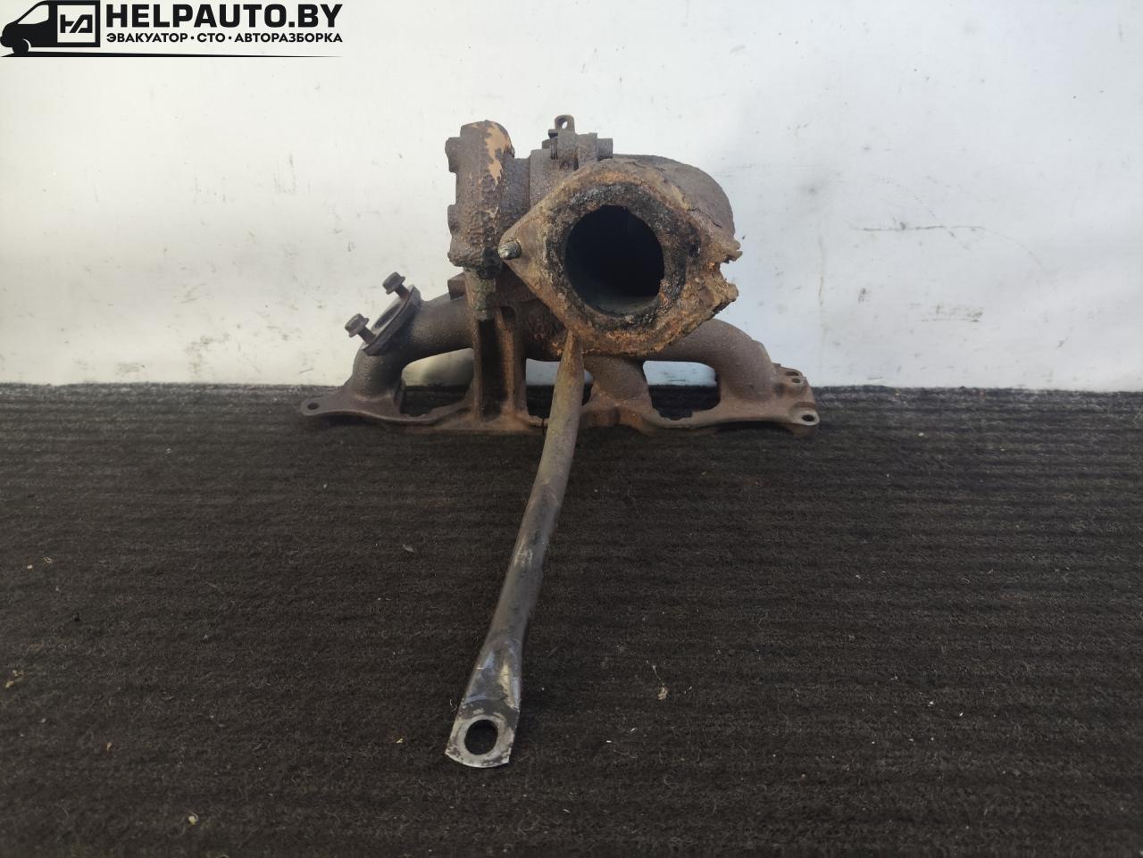 коллектор выпускной Renault Laguna 1 поколение 1996, 1.9 л., дизель, МКПП, серебристый, хетчбэк 5 дв., передний привод, 770087457 - фото №1