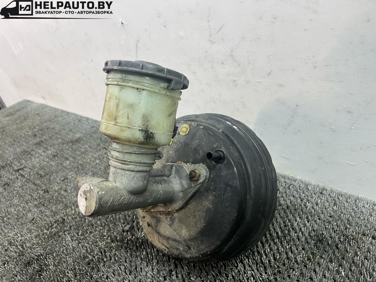 цилиндр тормозной главный Rover 600 Series 1 поколение 1994, 2.0 л., бензин, МКПП, зелёный, седан, передний привод - фото №1