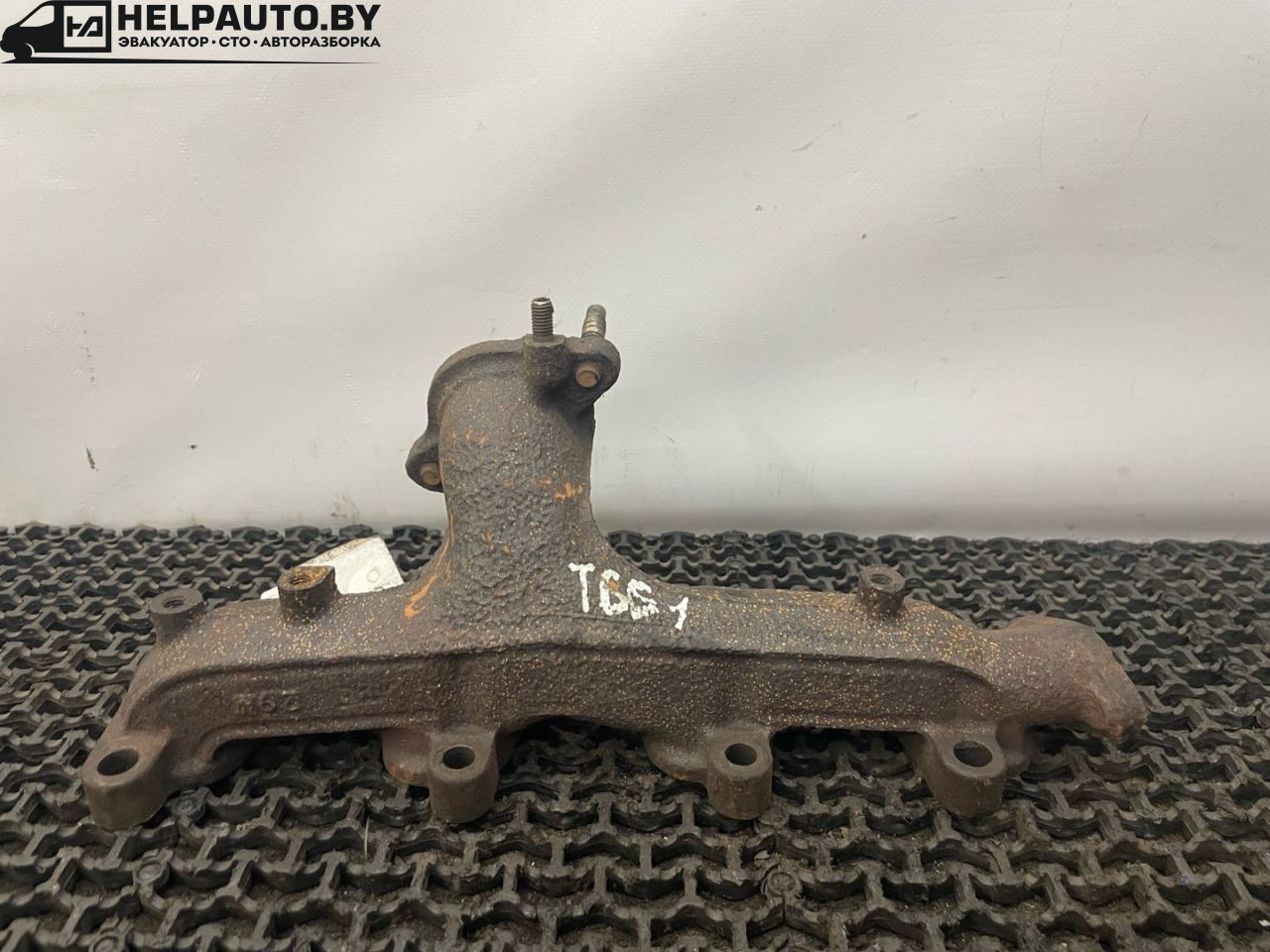 коллектор выпускной Toyota Carina E 1 поколение T190 1997, 2.0 л., дизель, МКПП, зеленый, седан - фото №1