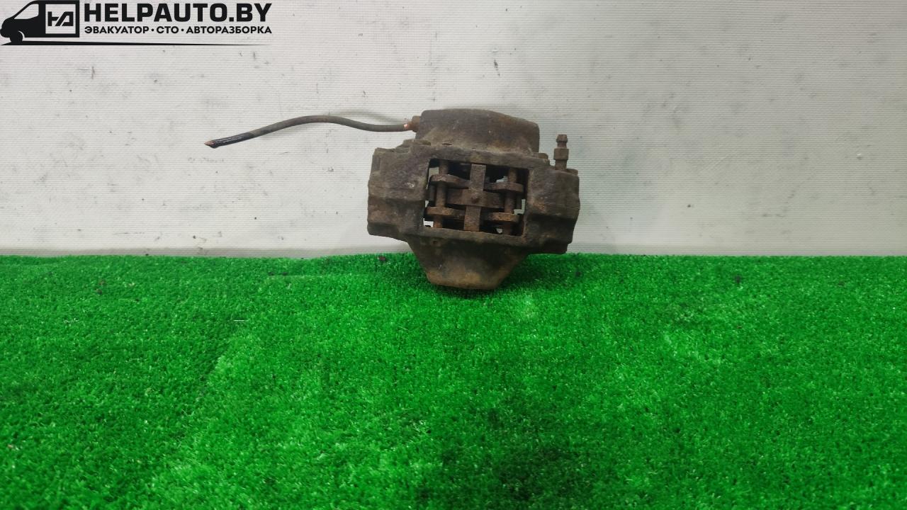 суппорт задний правый Opel Vectra B 1998, 1.8 л., бензин, МКПП, мокрый асфальт, универсал - фото №1