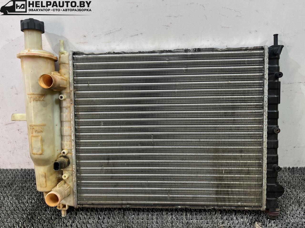 радиатор (основной) Fiat Palio 1 поколение 1998, 1.2 л., бензин, МКПП, черный, универсал, передний привод - фото №1