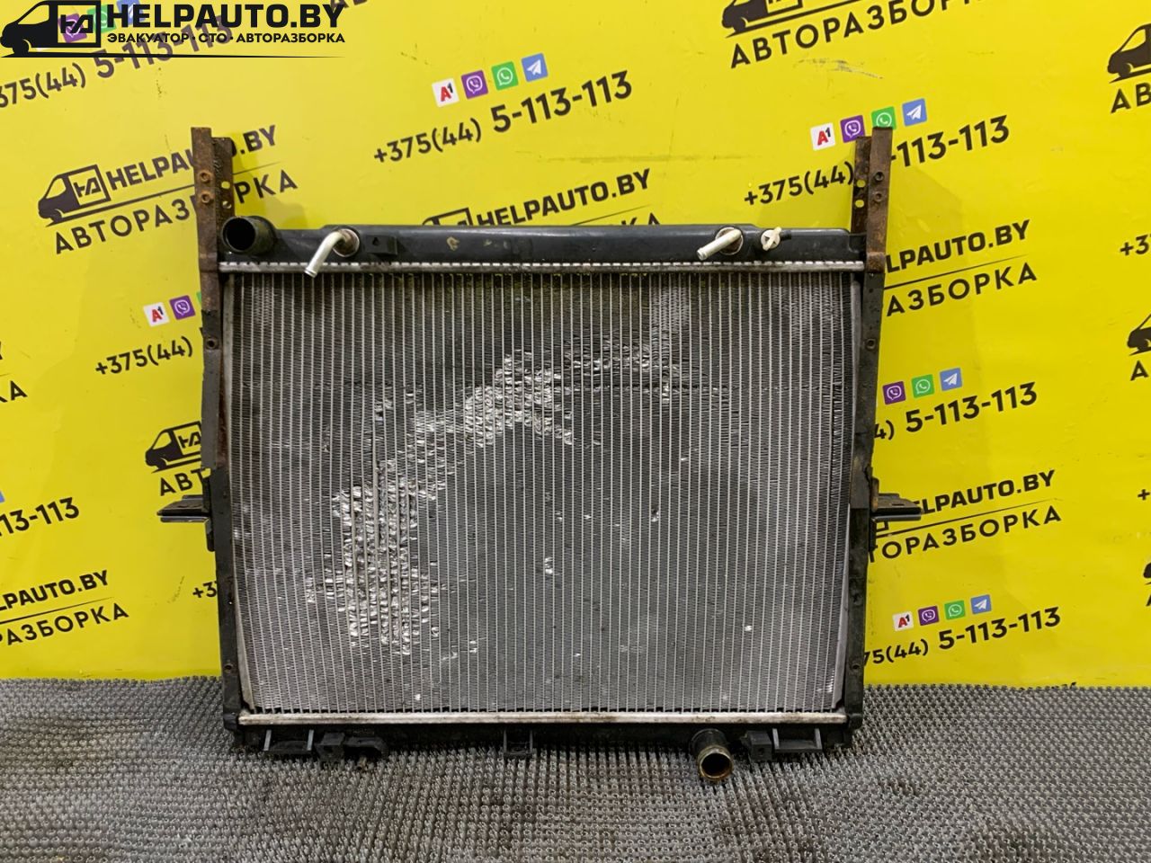 радиатор (основной) Kia Sorento 1 поколение 2005, 2.5 л., D4CB, дизель, АКПП, черный, внедорожник 5 дв., полный подключаемый привод - фото №1