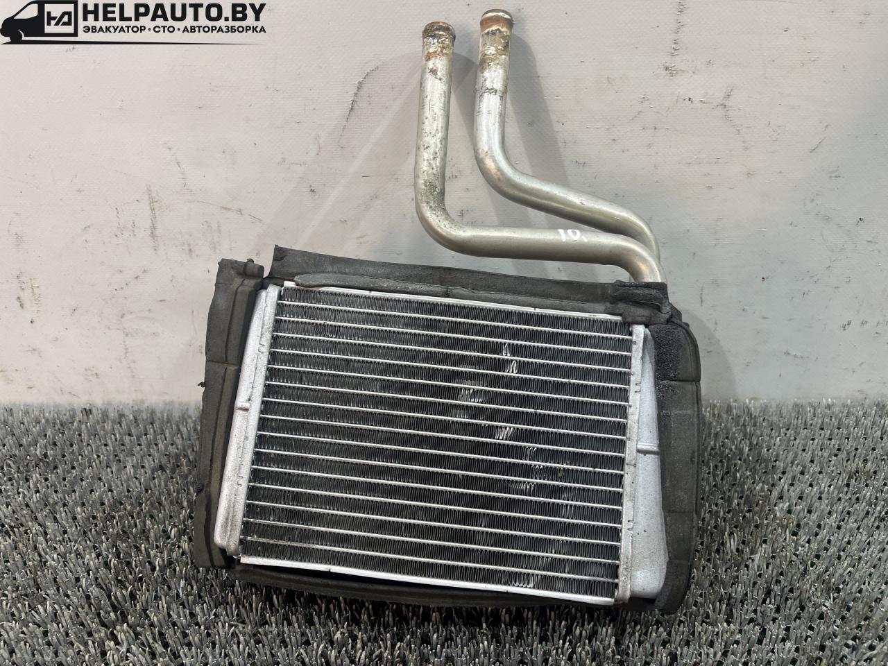 радиатор отопителя (печки) Ford Focus 1 поколение (1998 - 2001), дизель, МКПП, белый, универсал, передний привод - фото №1