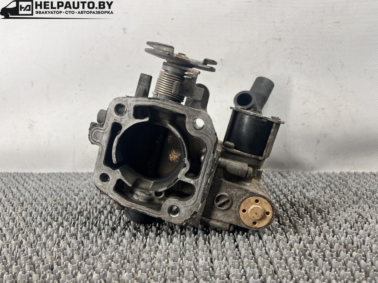 заслонка дроссельная Mazda 323 6 поколение 1998, 1.4 л., бензин, МКПП, синий, хетчбэк 3 дв., передний привод - фото №1