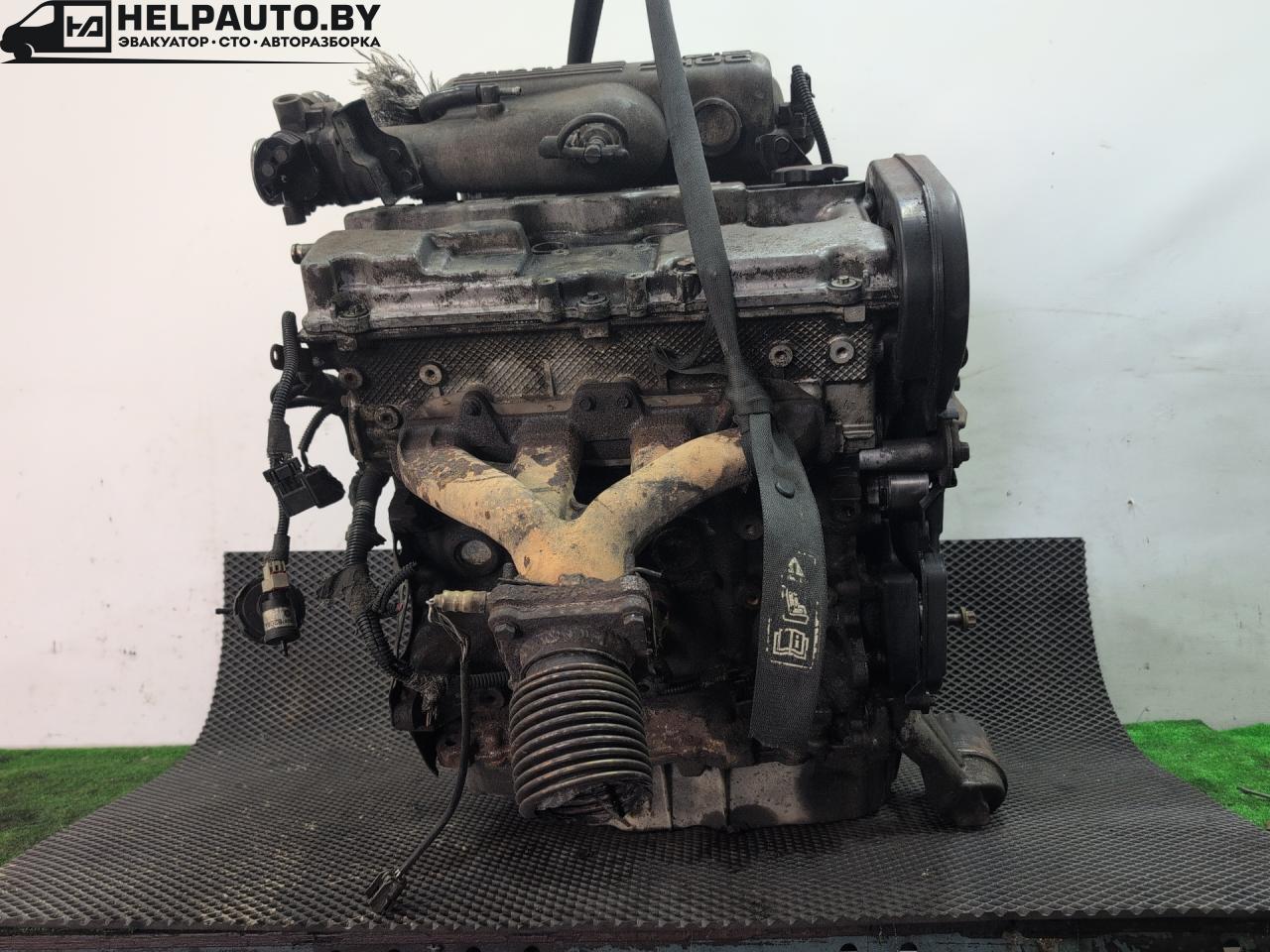 двигатель Chrysler Voyager 3 поколение 1998, 2.4 л., EDZ, бензин, МКПП, чёрный, минивэн, передний привод - фото №1