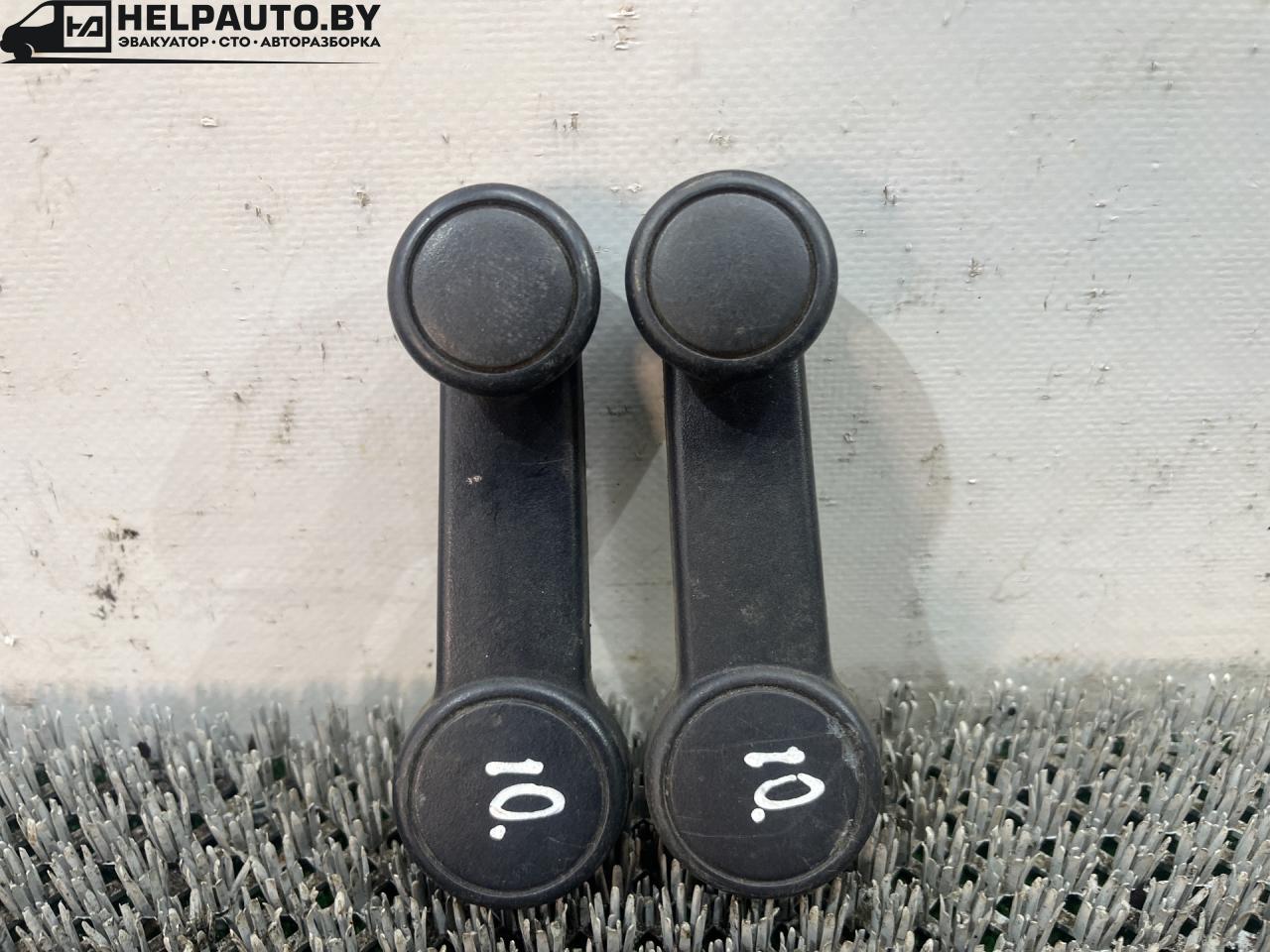 ручка стеклоподъемника Ford Focus 1 поколение (1998 - 2001), дизель, МКПП, белый, универсал, передний привод - фото №1